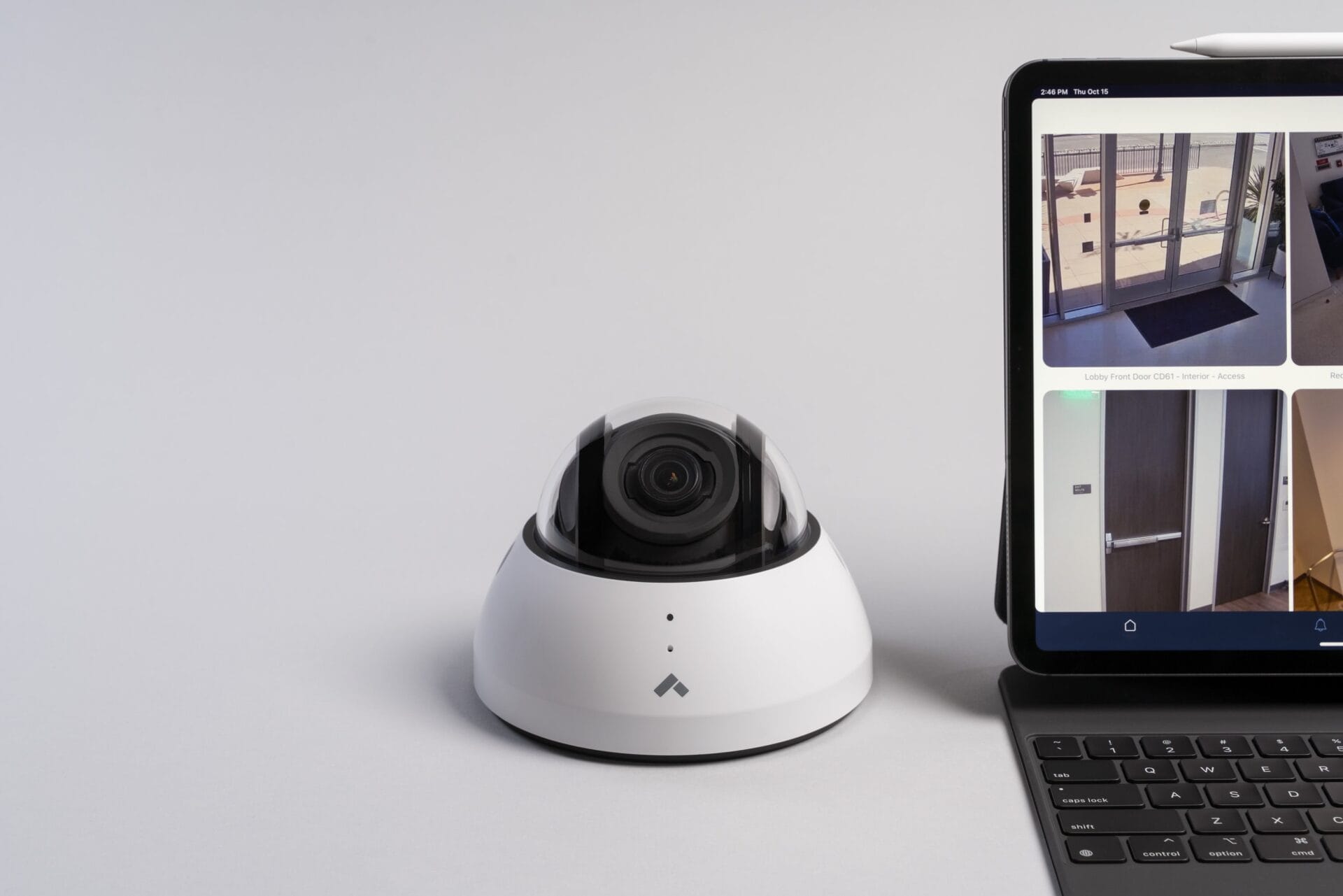 verkada dome camera next to a laptop