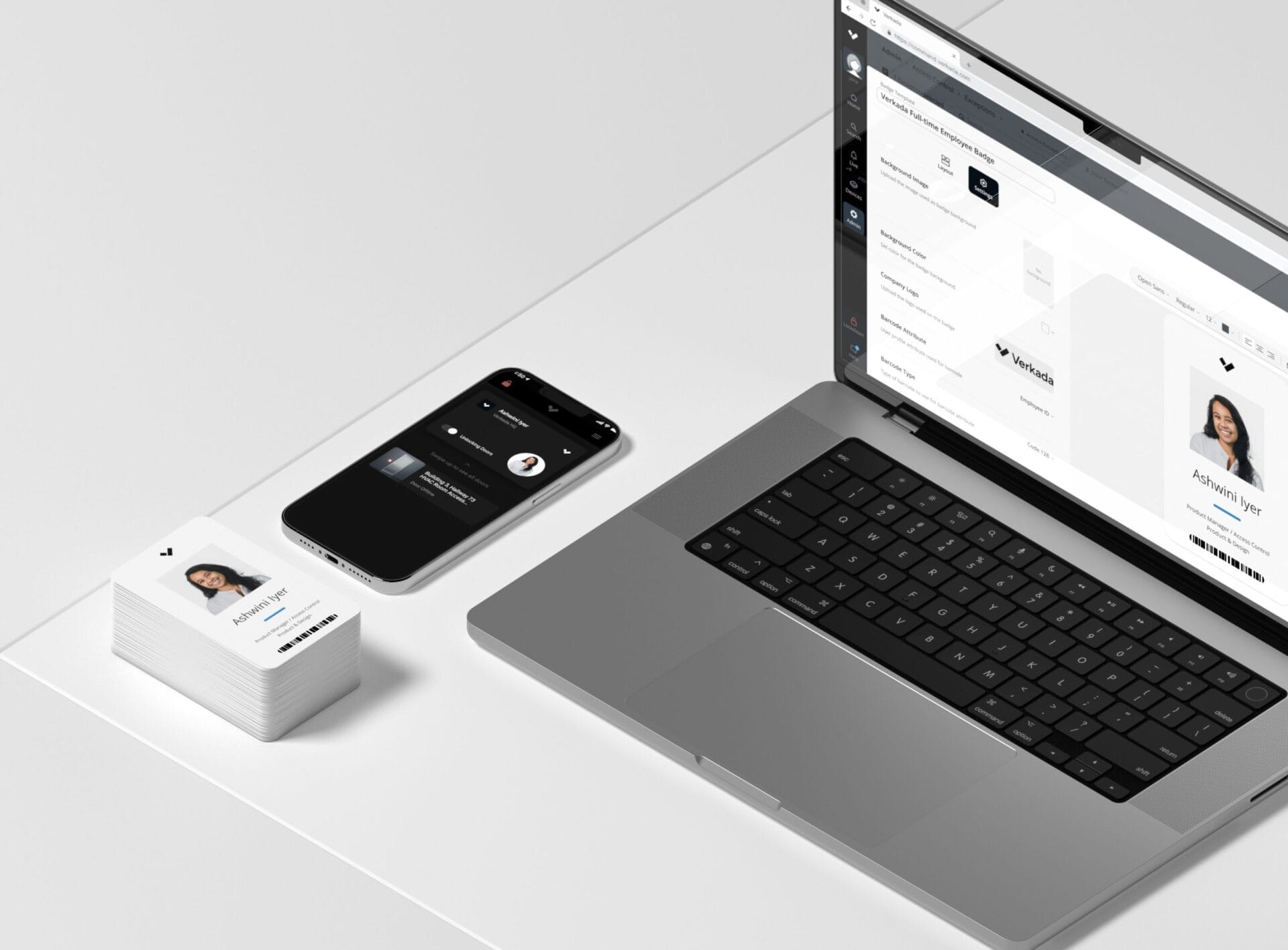 ID badges next to laptop displaying Verkada interface on which access control and security cameras are managed