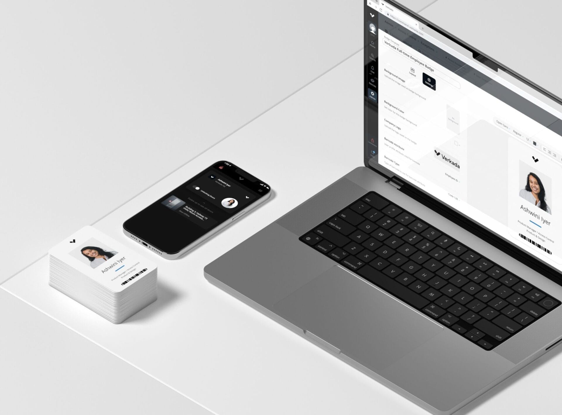 ID badges next to laptop displaying footage from best PoE camera systems