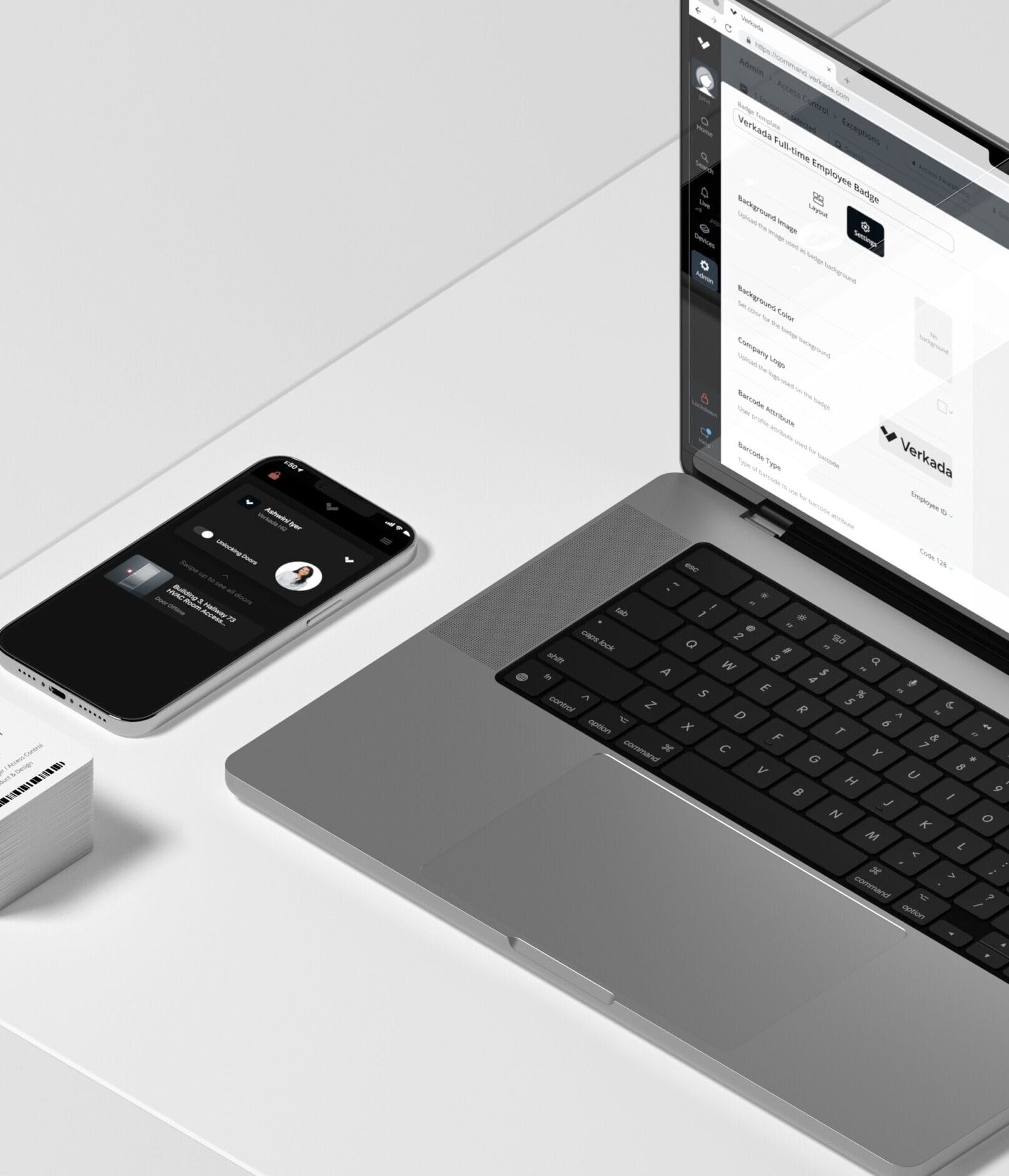 ID Badges next to laptop displaying Verkada’s Command interface on which users manage security cameras and access control