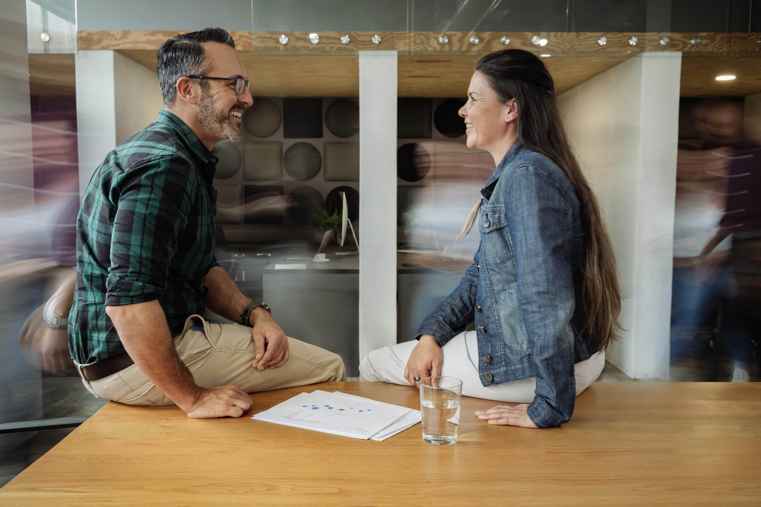 Las Vegas business partners discussing the benefits of their new surveillance cameras