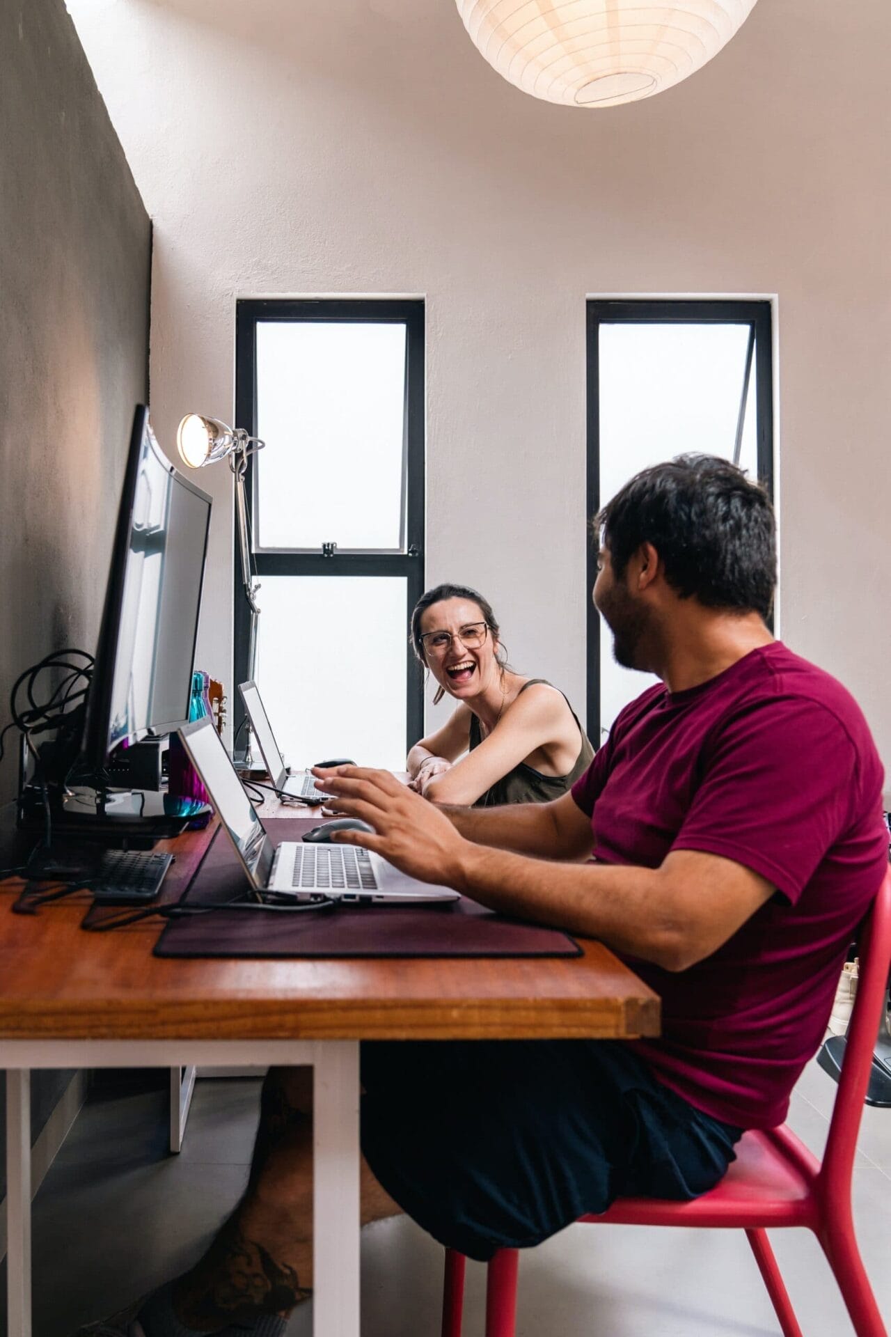 Security team on computer researching benefits of 4k outdoor security cameras